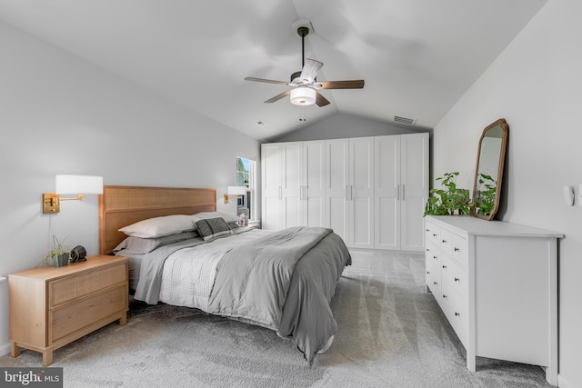 9307 Cedar Forest Dr, Fredericksburg, VA 22408 - bedroom featuring light colored carpet, vaulted ceiling, and ceiling fan