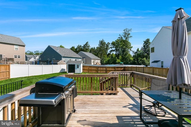 9307 Cedar Forest Dr, Fredericksburg, VA 22408 - wooden terrace featuring a shed, a fenced backyard, and a residential view