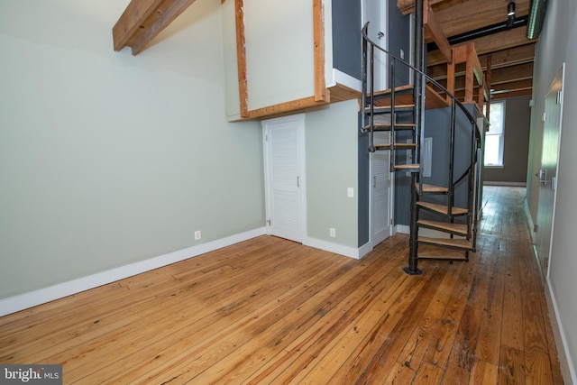 309 Arch St Unit 301, Philadelphia, PA 19106 - below grade area with hardwood / wood-style floors, stairs, and baseboards
