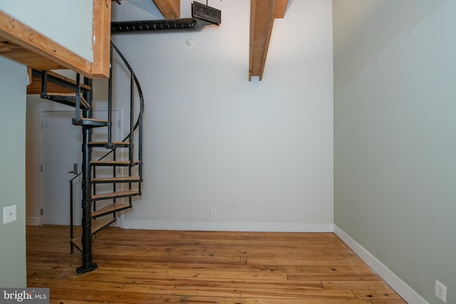 309 Arch St Unit 301, Philadelphia, PA 19106 - below grade area with hardwood / wood-style flooring, baseboards, and stairway