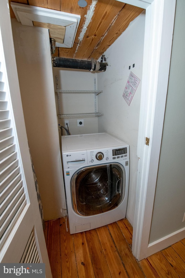 309 Arch St Unit 301, Philadelphia, PA 19106 - washroom featuring washer / clothes dryer and wood finished floors