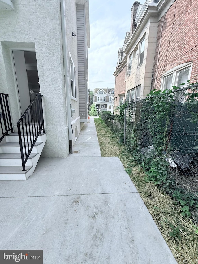 56 E Tulpehocken St, Philadelphia, PA 19144 - view of property's community with a patio area
