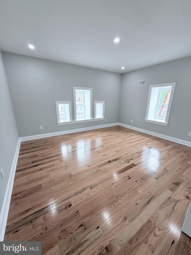 56 E Tulpehocken St, Philadelphia, PA 19144 - unfurnished room with wood finished floors, baseboards, and recessed lighting