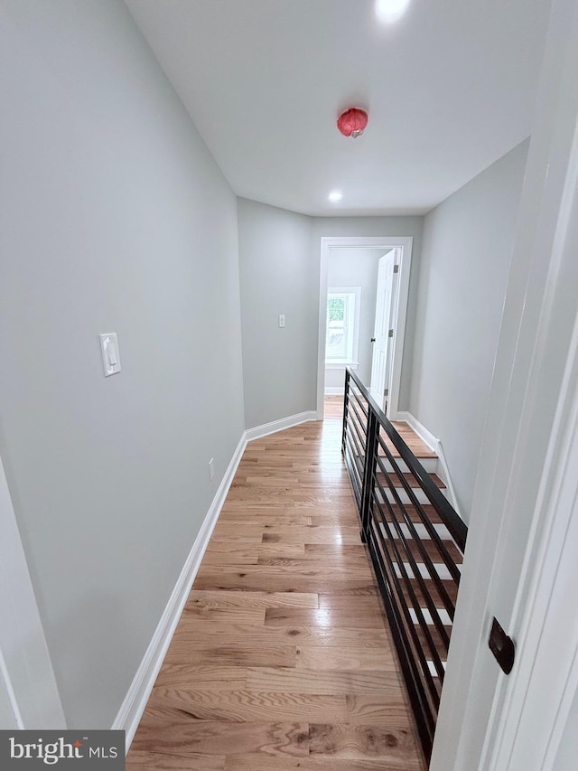 56 E Tulpehocken St, Philadelphia, PA 19144 - hallway featuring an upstairs landing, light wood-style floors, and baseboards