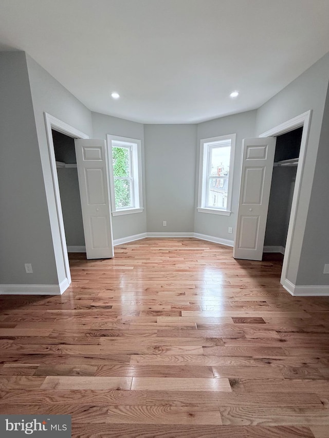 56 E Tulpehocken St, Philadelphia, PA 19144 - unfurnished bedroom with light wood-style floors, baseboards, recessed lighting, and a closet