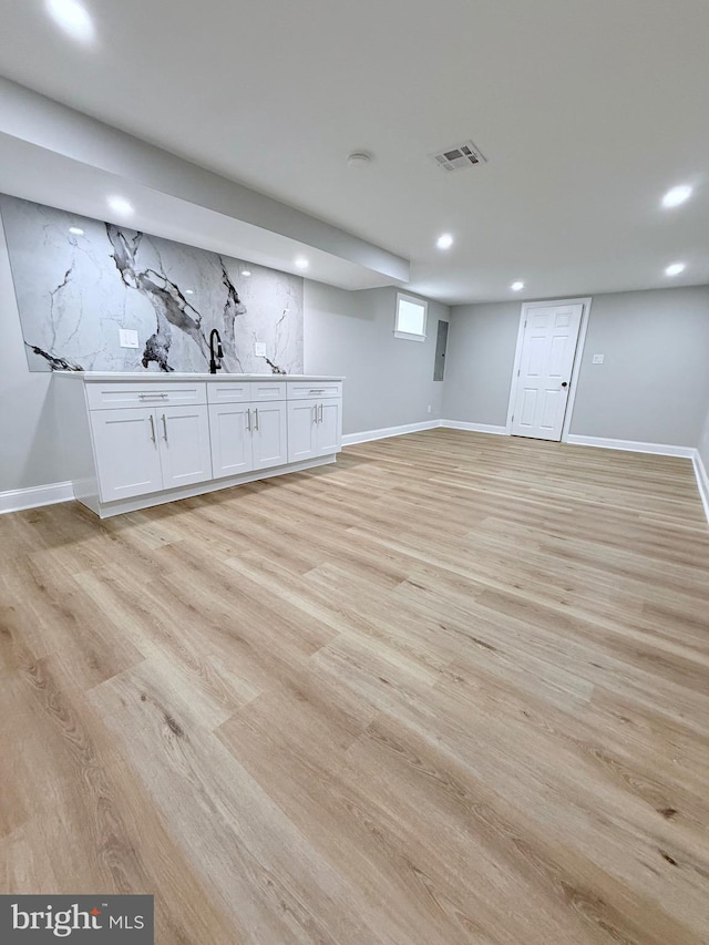 56 E Tulpehocken St, Philadelphia, PA 19144 - basement with light wood finished floors, recessed lighting, and baseboards