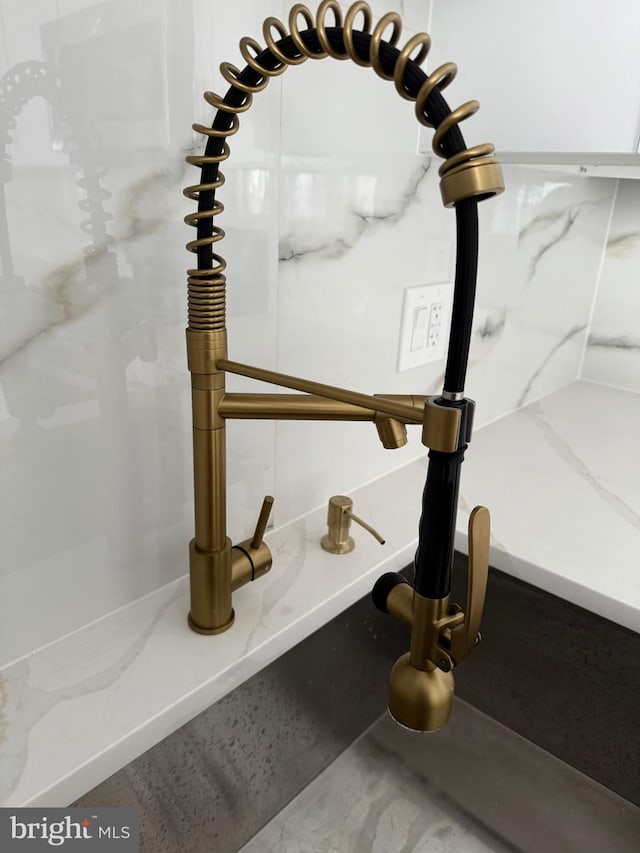 56 E Tulpehocken St, Philadelphia, PA 19144 - kitchen view of a sink and light stone countertops