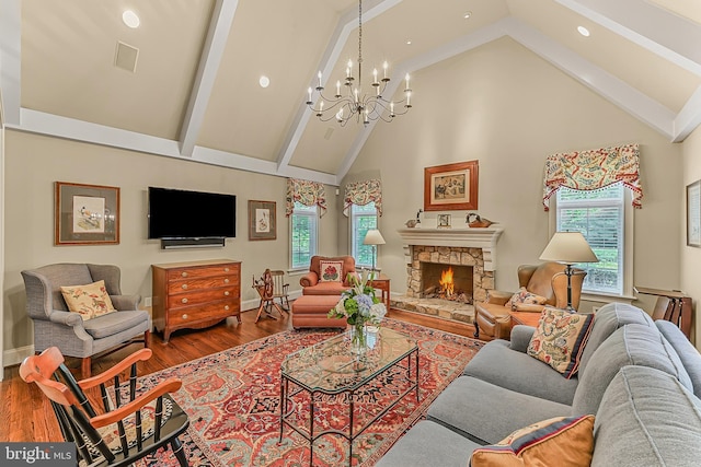 217 Valley Ridge Rd, Haverford, PA 19041 - living area with high vaulted ceiling, wood finished floors, a chandelier, plenty of natural light, and recessed lighting