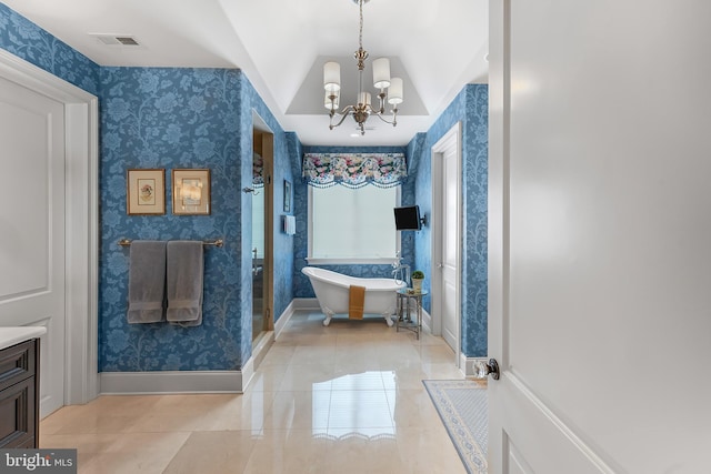 217 Valley Ridge Rd, Haverford, PA 19041 - full bathroom featuring wallpapered walls, tile patterned flooring, a chandelier, a freestanding tub, and vanity