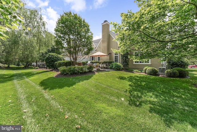 217 Valley Ridge Rd, Haverford, PA 19041 - view of green lawn with a patio