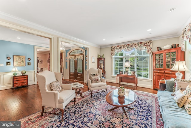 217 Valley Ridge Rd, Haverford, PA 19041 - living area with wood finished floors, ornamental molding, wainscoting, and recessed lighting