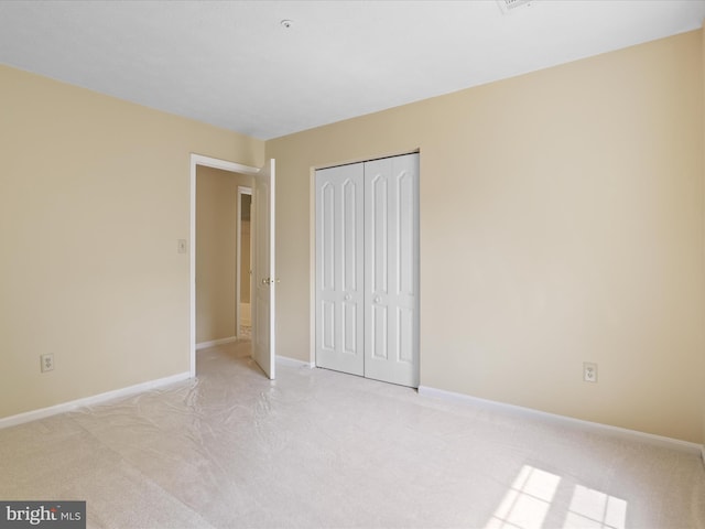 4514 Running Deer Way Unit 390A, Bowie, MD 20720 - unfurnished bedroom featuring light colored carpet and a closet