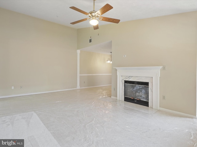 4514 Running Deer Way Unit 390A, Bowie, MD 20720 - unfurnished living room featuring a premium fireplace, vaulted ceiling, and a ceiling fan