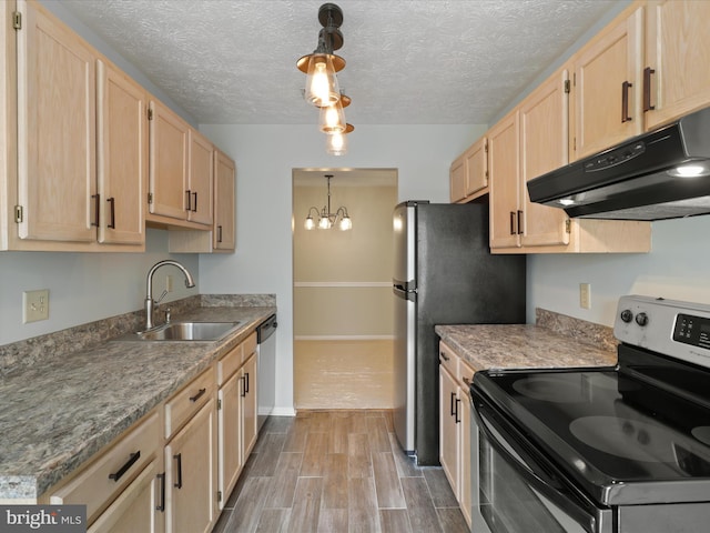 4514 Running Deer Way Unit 390A, Bowie, MD 20720 - kitchen with appliances with stainless steel finishes, exhaust hood, light brown cabinets, wood finished floors, and a textured ceiling