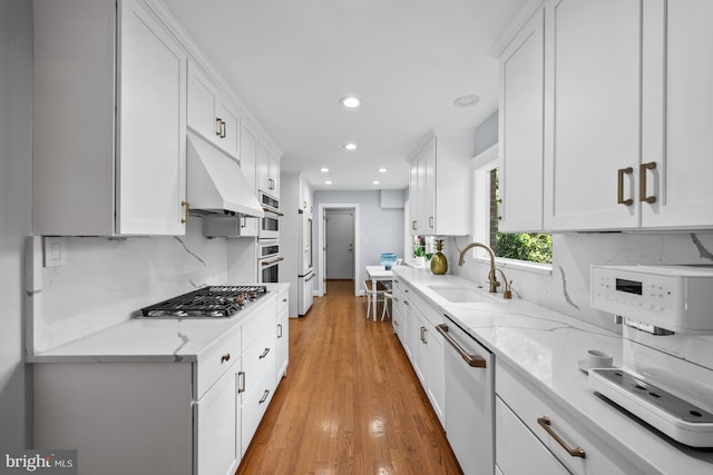 9017 Rouen Ln, Potomac, MD 20854 - kitchen featuring dishwasher, a sink, recessed lighting, white cabinets, and decorative backsplash