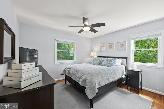 9017 Rouen Ln, Potomac, MD 20854 - bedroom featuring wood finished floors, baseboards, and ceiling fan