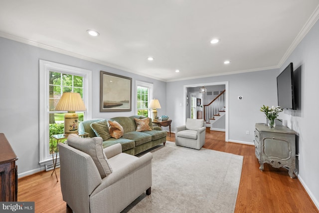 9017 Rouen Ln, Potomac, MD 20854 - living room featuring stairs, wood finished floors, ornamental molding, baseboards, and recessed lighting