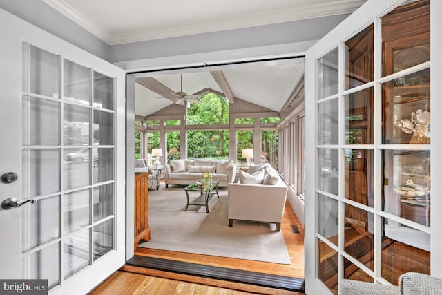 9017 Rouen Ln, Potomac, MD 20854 - sunroom featuring wood finished floors, crown molding, and french doors