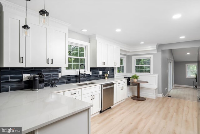2 Tall Timber Ln, Burlington, NJ 08016 - kitchen with stainless steel dishwasher, white cabinets, decorative backsplash, recessed lighting, and light wood-type flooring