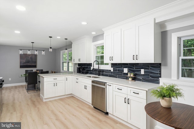 2 Tall Timber Ln, Burlington, NJ 08016 - kitchen with dishwasher, a peninsula, backsplash, white cabinets, and light countertops