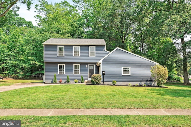 2 Tall Timber Ln, Burlington, NJ 08016 - colonial house with a front lawn and view of scattered trees