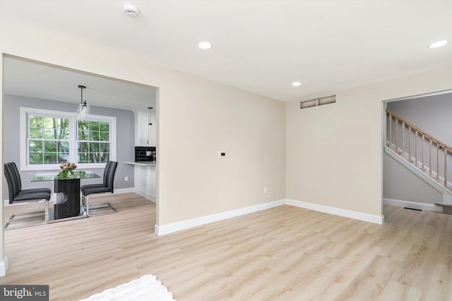2 Tall Timber Ln, Burlington, NJ 08016 - unfurnished living room with light wood-style floors, stairs, and recessed lighting