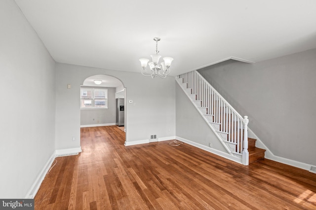 3333 Ashville St, Philadelphia, PA 19136 - interior space featuring arched walkways, a chandelier, stairway, and wood finished floors