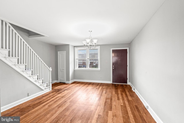 3333 Ashville St, Philadelphia, PA 19136 - entryway featuring wood finished floors, a chandelier, and stairs