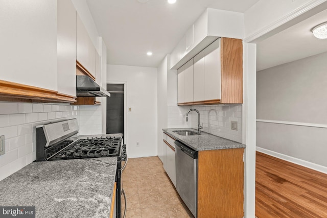 3333 Ashville St, Philadelphia, PA 19136 - kitchen featuring stainless steel appliances, under cabinet range hood, backsplash, white cabinetry, and recessed lighting