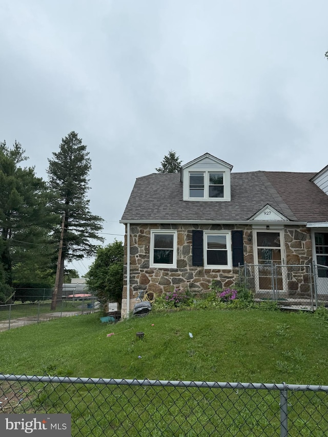 927 Woodlawn Ave, Phoenixville, PA 19460 - view of front of home with stone siding and roof with shingles