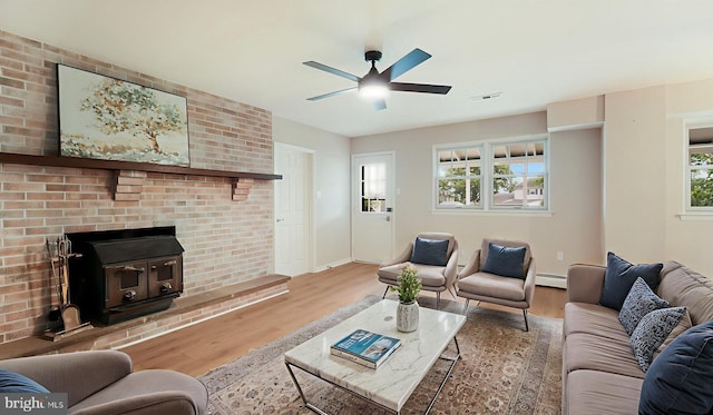 17 Rosemore Dr, Chalfont, PA 18914 - living area with wood finished floors, a baseboard radiator, and a ceiling fan