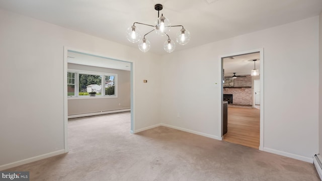 17 Rosemore Dr, Chalfont, PA 18914 - empty room with a baseboard radiator, carpet floors, a chandelier, a fireplace, and baseboard heating