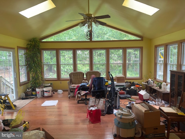 1701 Underwood Rd, Sykesville, MD 21784 - living room featuring a skylight, wood finished floors, healthy amount of natural light, ceiling fan, and lofted ceiling