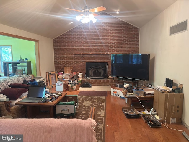 1701 Underwood Rd, Sykesville, MD 21784 - living area featuring brick wall, ceiling fan, lofted ceiling, and wood finished floors