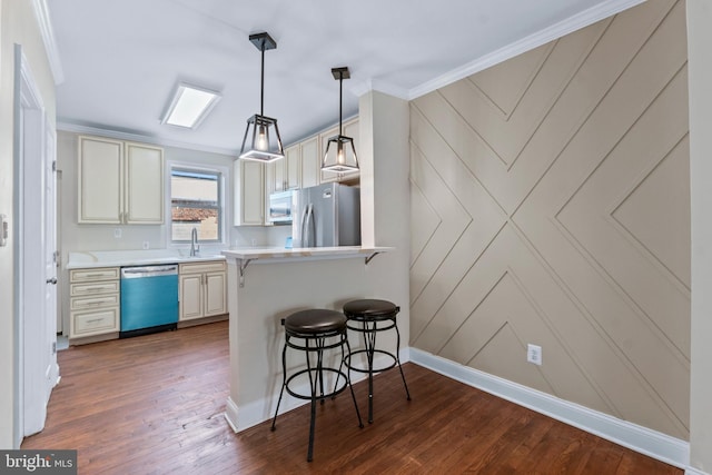 1521 Bush St, Baltimore, MD 21230 - kitchen featuring freestanding refrigerator, dishwasher, a kitchen bar, wood-type flooring, and light countertops