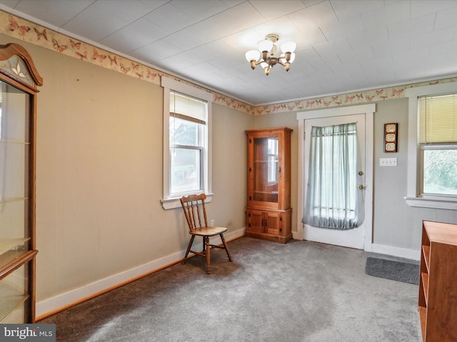 12225 Upper Georges Creek Rd SW, Frostburg, MD 21532 - carpeted foyer featuring a chandelier and baseboards