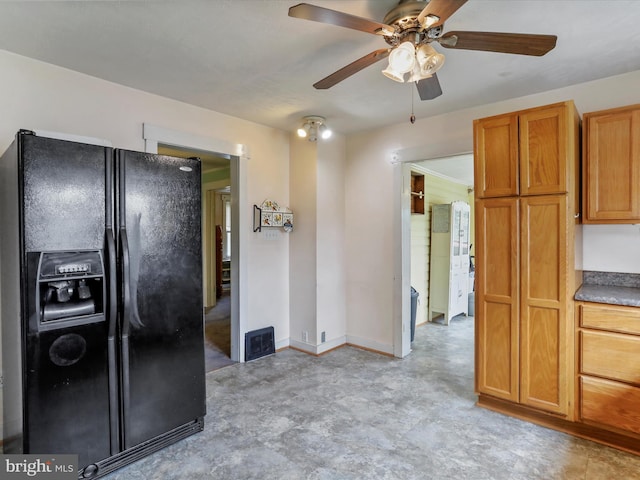 12225 Upper Georges Creek Rd SW, Frostburg, MD 21532 - kitchen featuring black refrigerator with ice dispenser, a ceiling fan, brown cabinetry, and light flooring