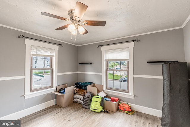 23 Ridge Ave, Hanover, PA 17331 - game room with baseboards, wood finished floors, a ceiling fan, and ornamental molding