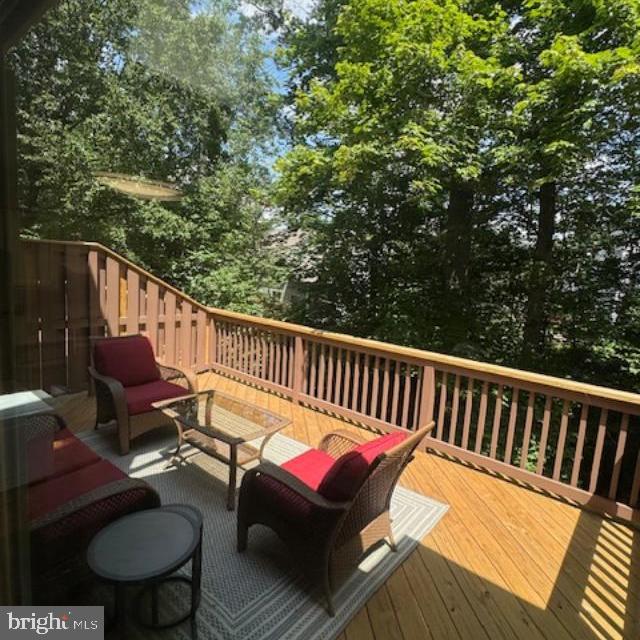 303 Green Meadow Ln, Horsham, PA 19044 - wooden deck featuring outdoor lounge area and view of scattered trees