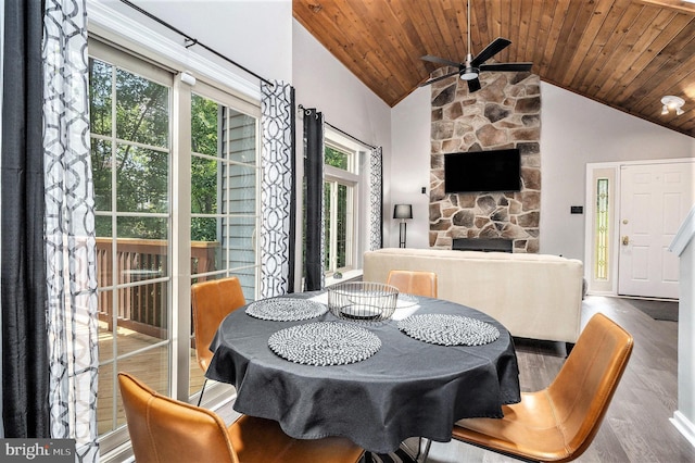 303 Green Meadow Ln, Horsham, PA 19044 - dining space featuring ceiling fan, a fireplace, wood finished floors, wood ceiling, and high vaulted ceiling