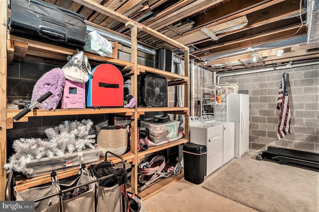 303 Green Meadow Ln, Horsham, PA 19044 - unfinished basement with washer and dryer, freestanding refrigerator, and concrete block wall