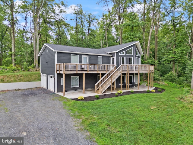 2554 High Top Rd, Linden, VA 22642 - view of front facade with an attached garage, a wooden deck, stairs, a patio, and a sunroom
