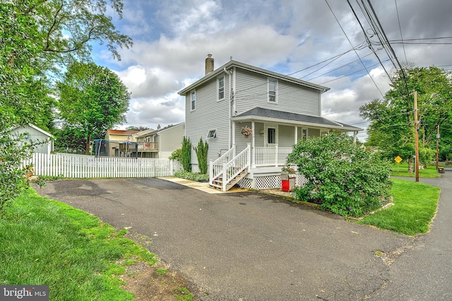 320 Pearl Ave, Horsham, PA 19044 - view of front of home featuring a chimney, driveway, and a porch