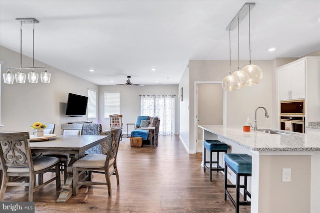 27 Quiet Creek Dr, Gettysburg, PA 17325 - dining space with dark wood finished floors, ceiling fan, and recessed lighting