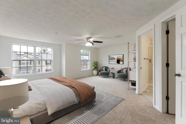 Goose Landing Cir, Columbia, MD 21044 - bedroom featuring light colored carpet, a textured ceiling, ceiling fan, and baseboards