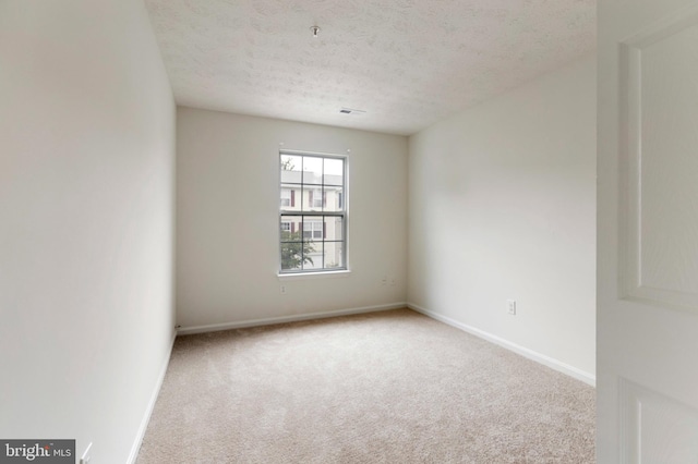 Goose Landing Cir, Columbia, MD 21044 - unfurnished room with carpet flooring, a textured ceiling, and baseboards