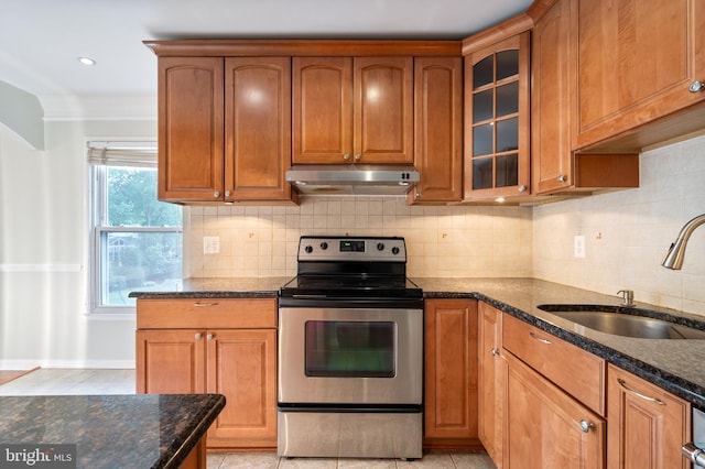 2413 Childs Ln, Alexandria, VA 22308 - kitchen featuring stainless steel range with electric cooktop, ventilation hood, dark stone countertops, glass insert cabinets, and ornamental molding