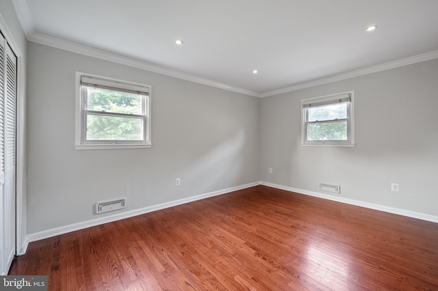 2413 Childs Ln, Alexandria, VA 22308 - spare room featuring wood finished floors, crown molding, and recessed lighting