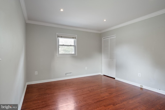 2413 Childs Ln, Alexandria, VA 22308 - spare room with ornamental molding, dark wood-style flooring, and recessed lighting