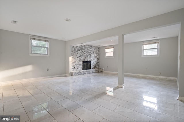 2413 Childs Ln, Alexandria, VA 22308 - unfurnished living room featuring a glass covered fireplace and light tile patterned floors